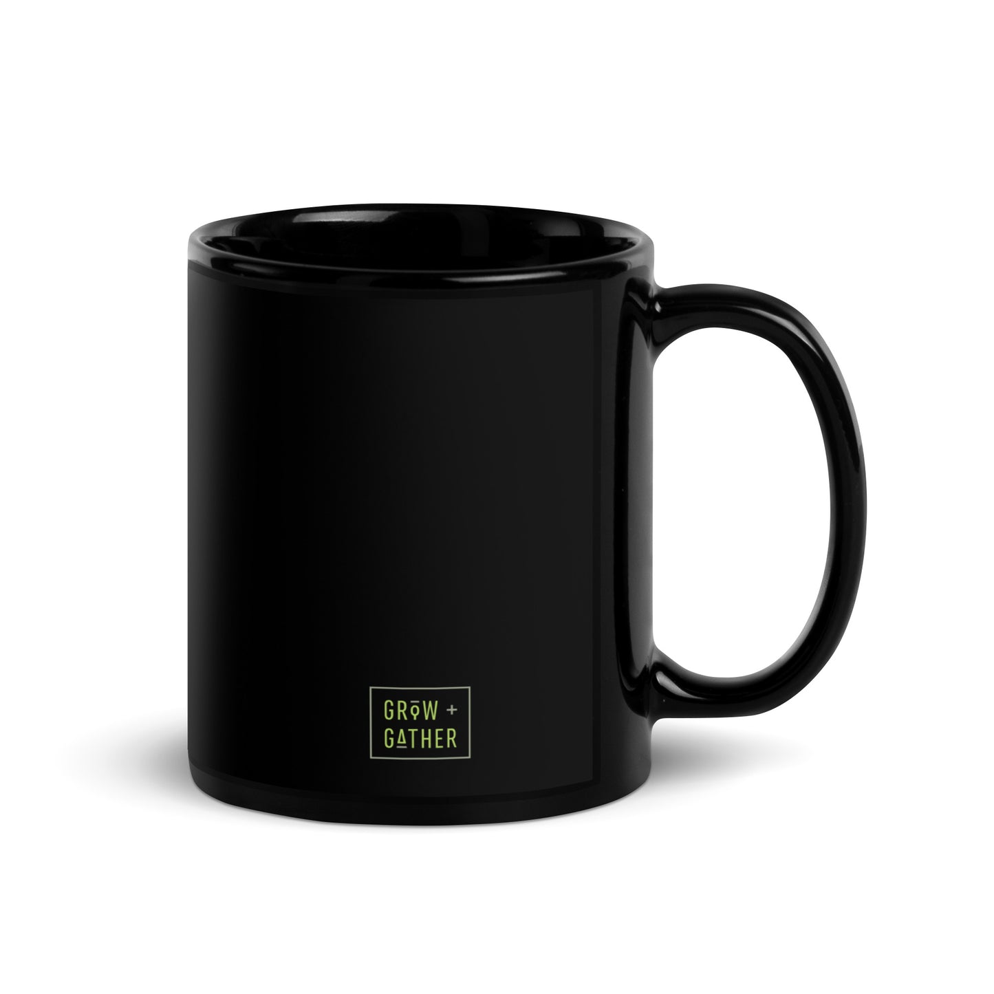 black ceramic mug with green grow graphic and vegetable icons